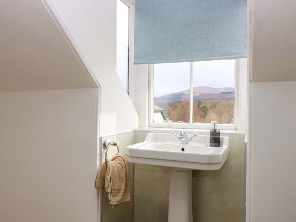 A bathroom with a sink and window view at Tayview in Killin
