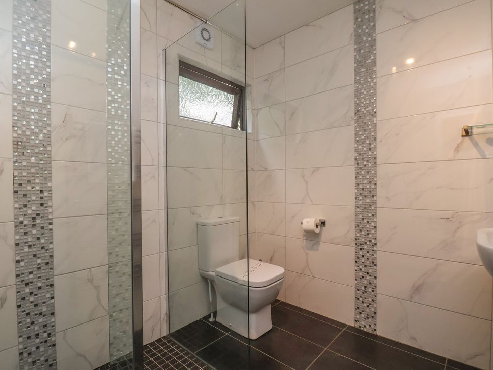 A bathroom with a toilet and sink at Bugle in Saltburn-By-The-Sea