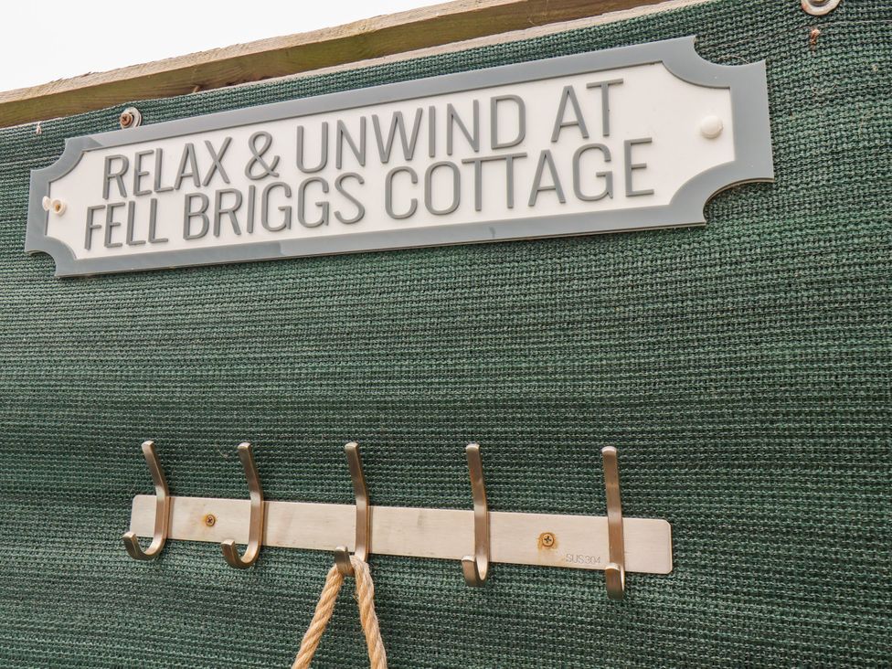 A sign and hooks at Fell Briggs Cottage in Marske-By-The-Sea