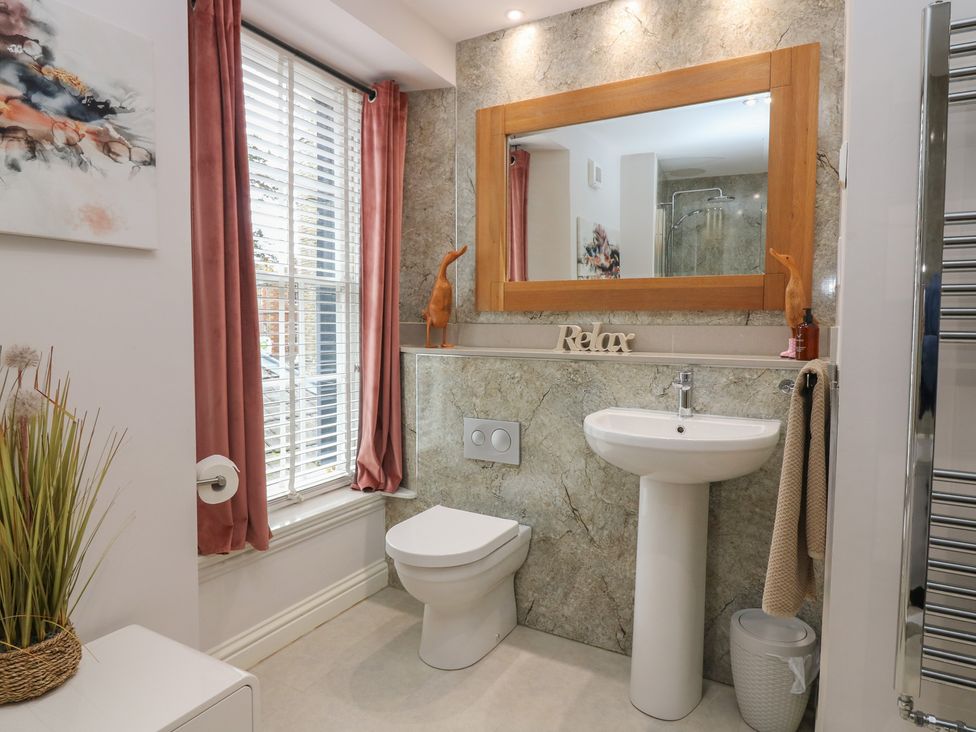 A bathroom featuring a sink and toilet at 2 Abbey Row, Kelso