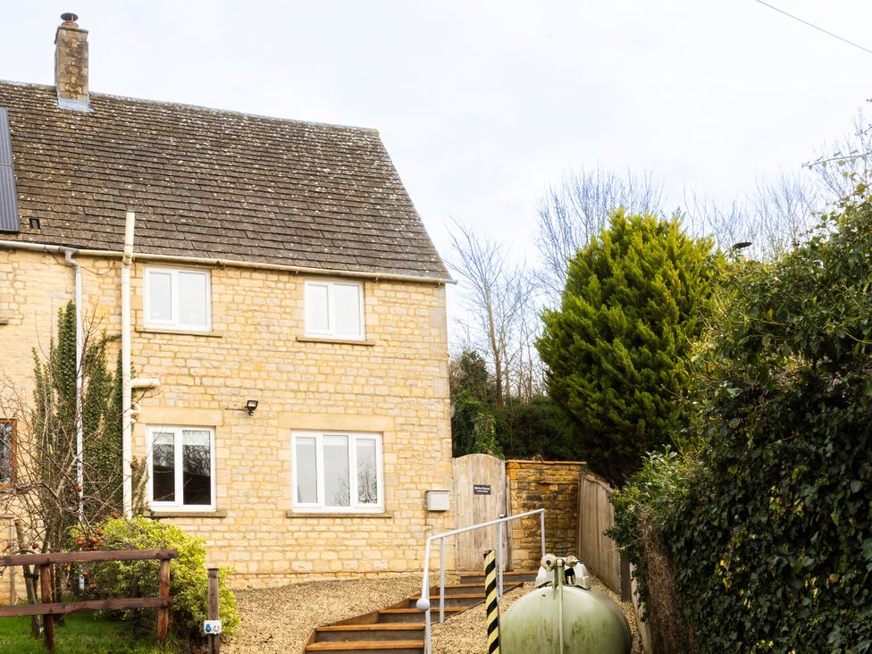 A house with windows and a door at White Stones, Fulbrook, near Burford
