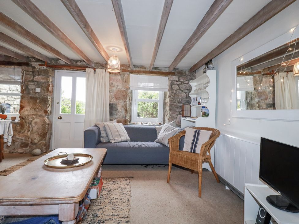 A living room with a sofa and coffee table at 3 The Green