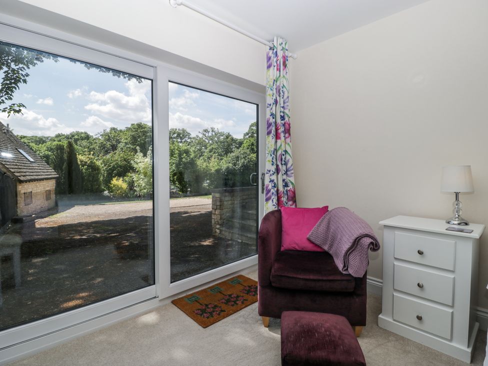 A snug with a window showing outdoor view at Bell Garden in Stow-On-The-Wold