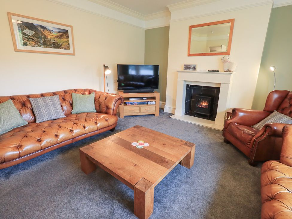 A living room with a coffee table and sofa at Hazelmere in Keswick