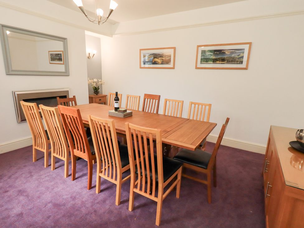 A dining room with a table and chairs at Hazelmere in Keswick