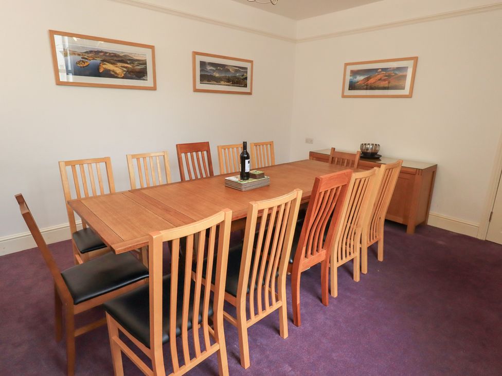 A dining room with a table and chairs at Hazelmere in Keswick