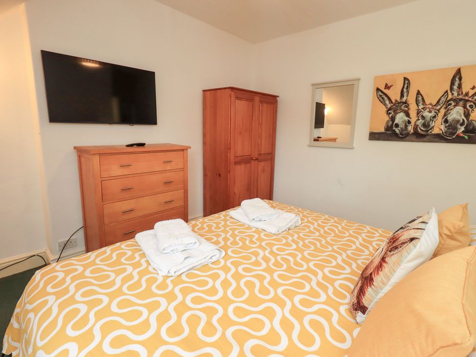 A bedroom with a bed and TV at Hazelmere in Keswick