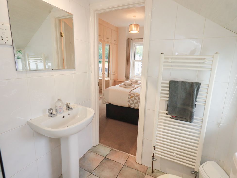 A bathroom with a sink and mirror at Hazelmere in Keswick
