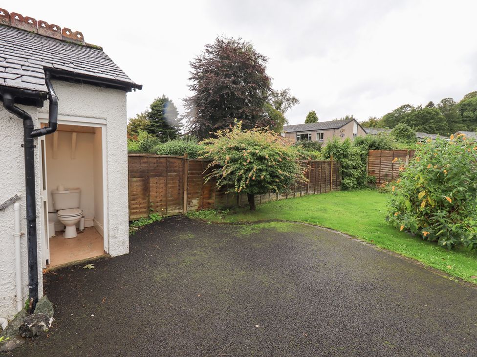 An outdoor area with a toilet visible and a garden at Hazelmere in Keswick