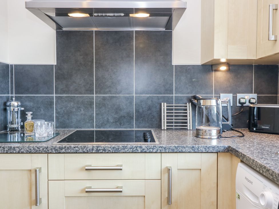 A kitchen with a countertop and various appliances at 6A Pitlethie Steading Leuchars