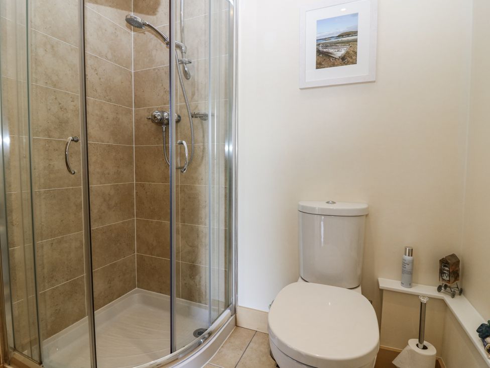 A bathroom with a shower and toilet at 6A Pitlethie Steading Leuchars