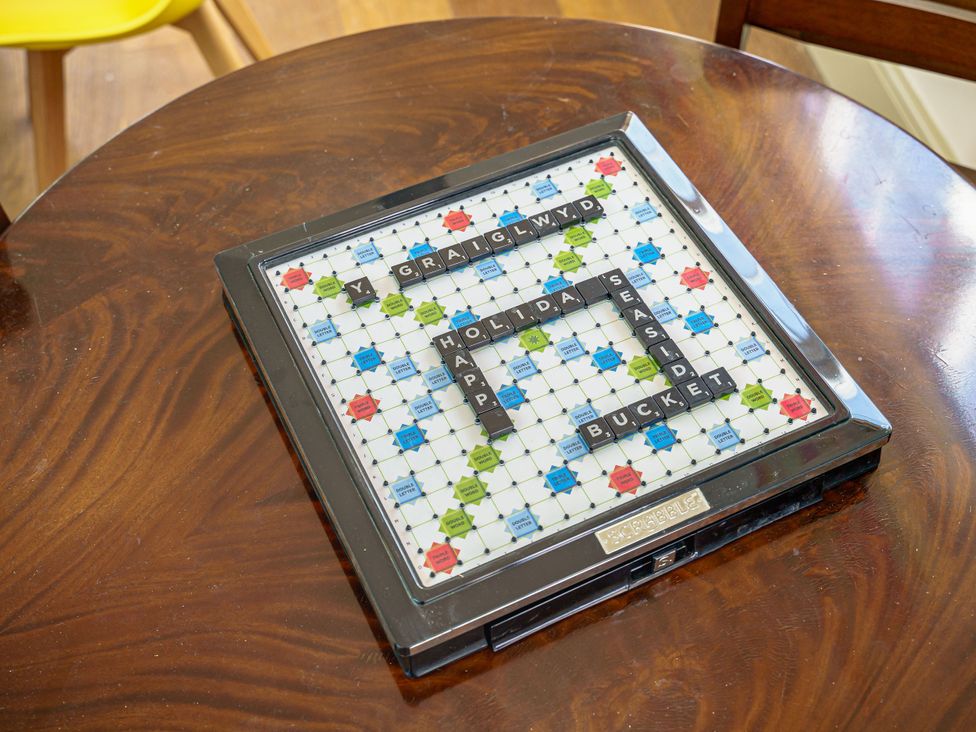 A scrabble board with letters on a table at Y Graiglwyd Bull Bay near Amlwch