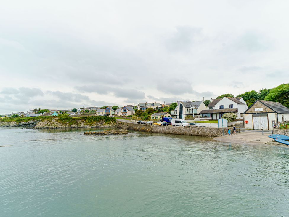 A view of houses by the water at Y Graiglwyd Bull Bay near Amlwch