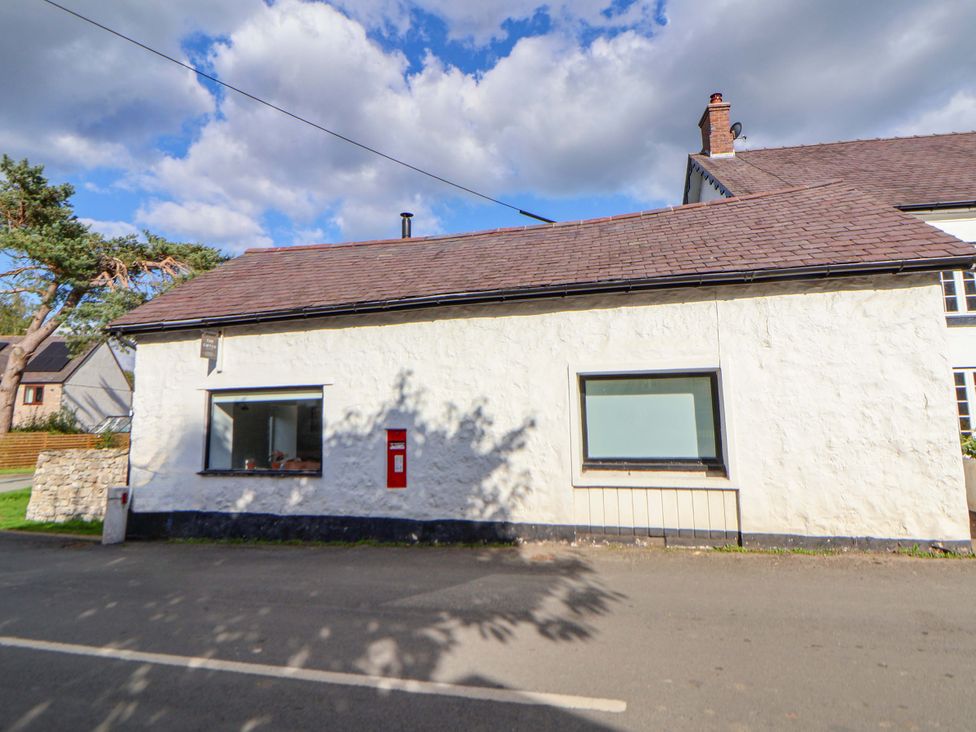 A house with a window and mailbox at Cwtch in Mold