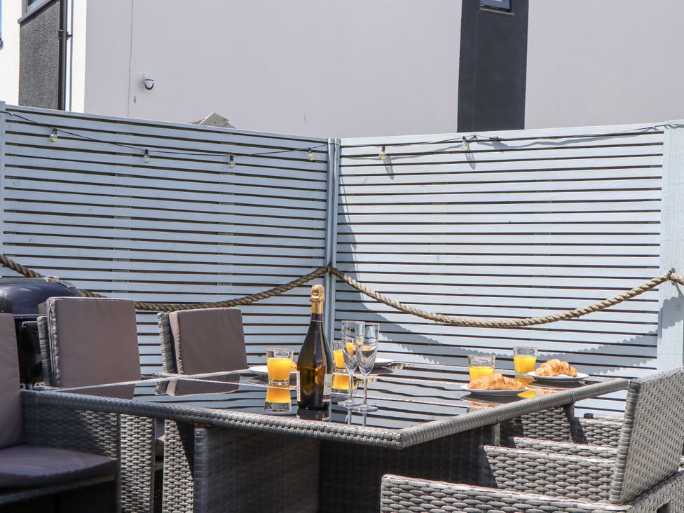 A table with drinks and food at Driftwood in Torquay
