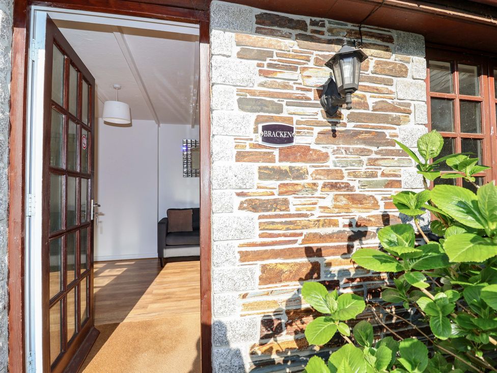 An entrance with a sofa visible in the background at Bracken Cottage St Tudy