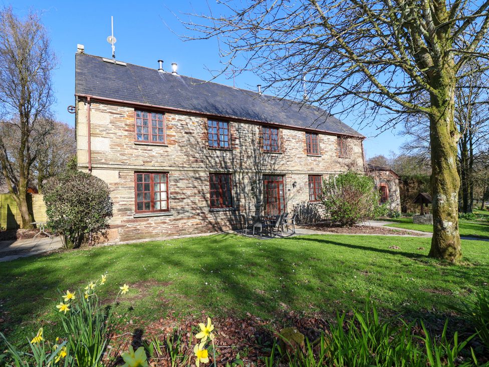 A house surrounded by garden space at Roughtor Cottage St Tudy