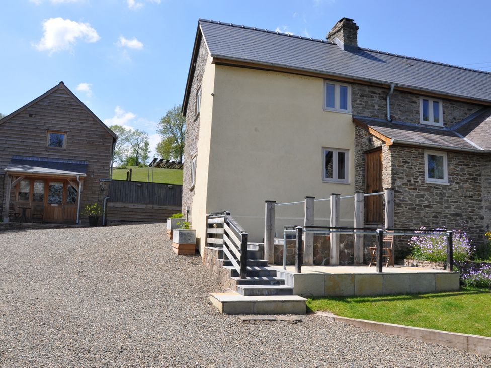 A house with steps and garden area at Rockhill Farmhouse in Clun