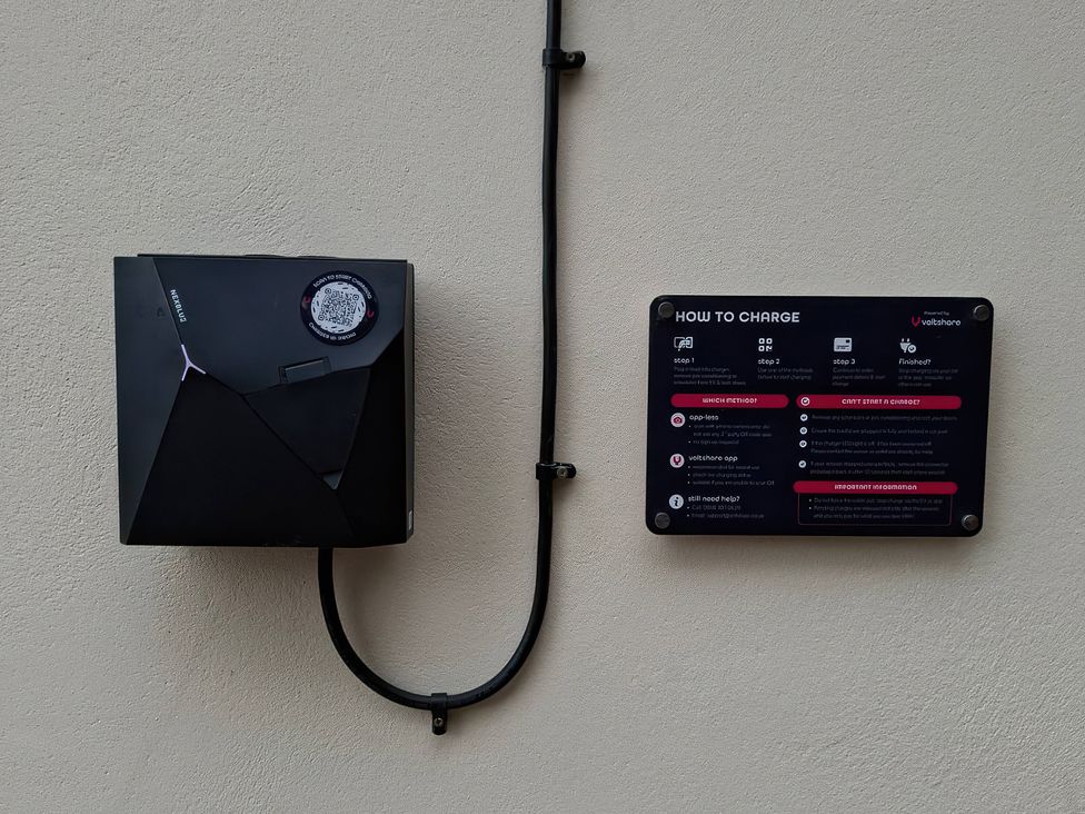 A charging station with instructions on how to charge at Teifi Villa in St Dogmaels
