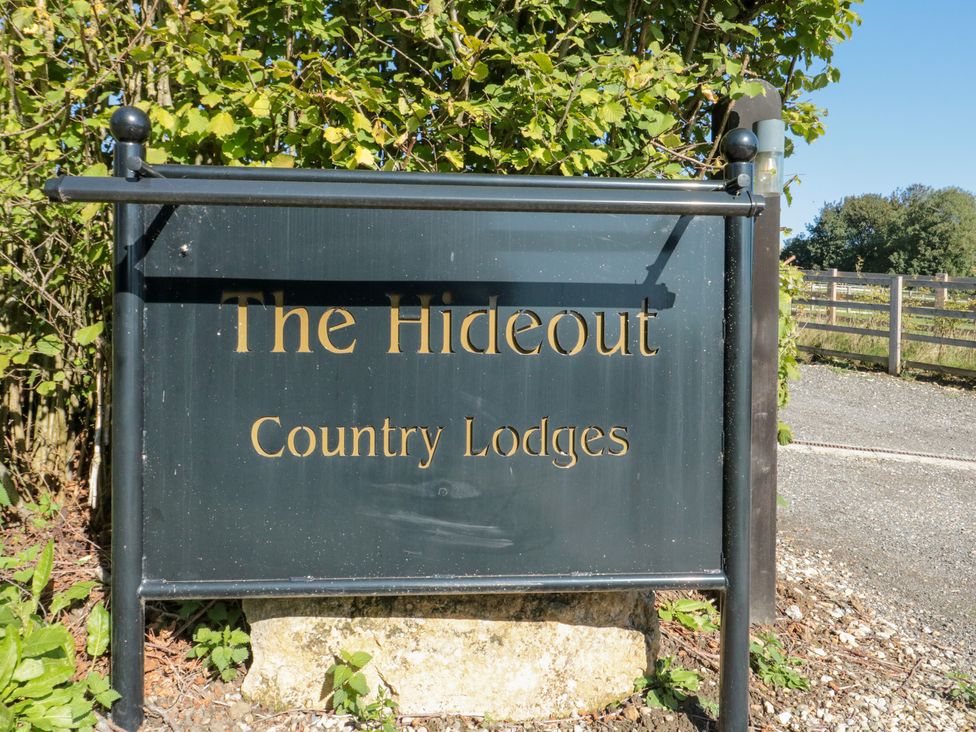 The Hideout country lodges sign at The Hideout in Allerston near Thornton Dale