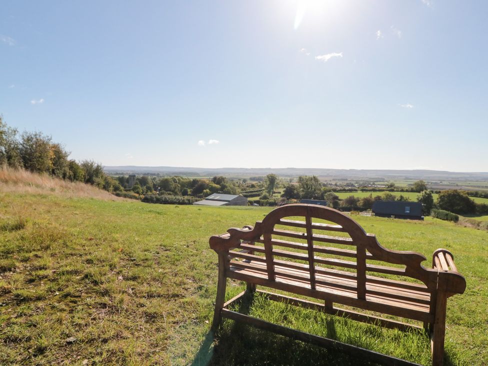 A bench overlooking a field at Foxes Den in Allerston near Thornton Dale