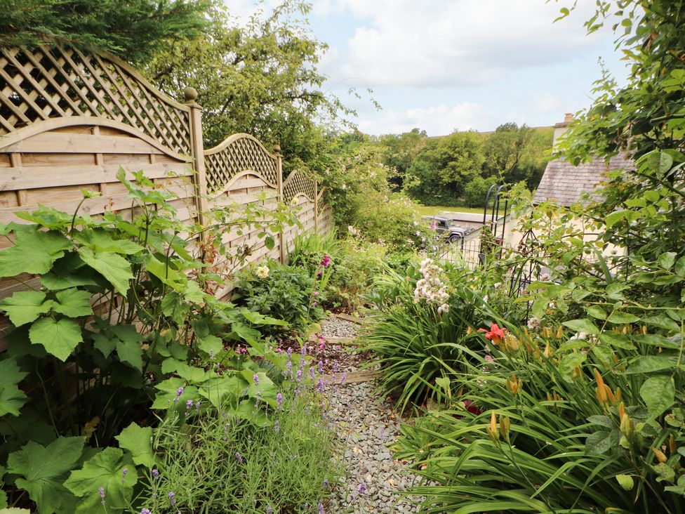 A garden with a pathway and plants at West View in Leasgill near Milnthorpe