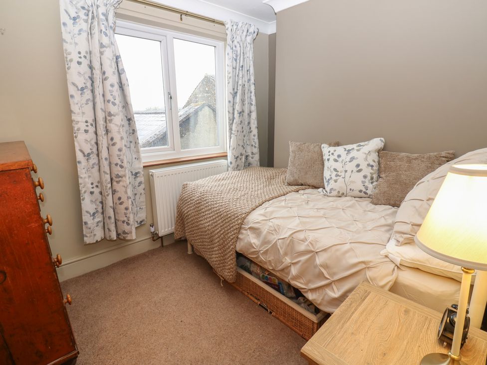 A bedroom with a bed and a window at Banklands in Barnard Castle
