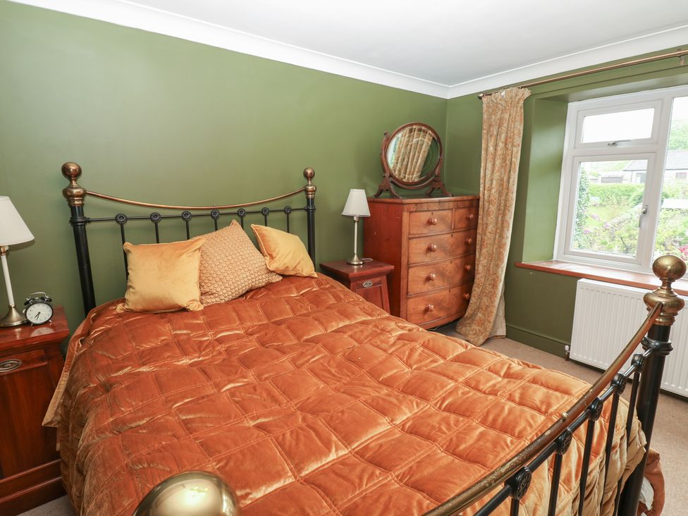 A bedroom with a bed and furniture at Banklands in Barnard Castle