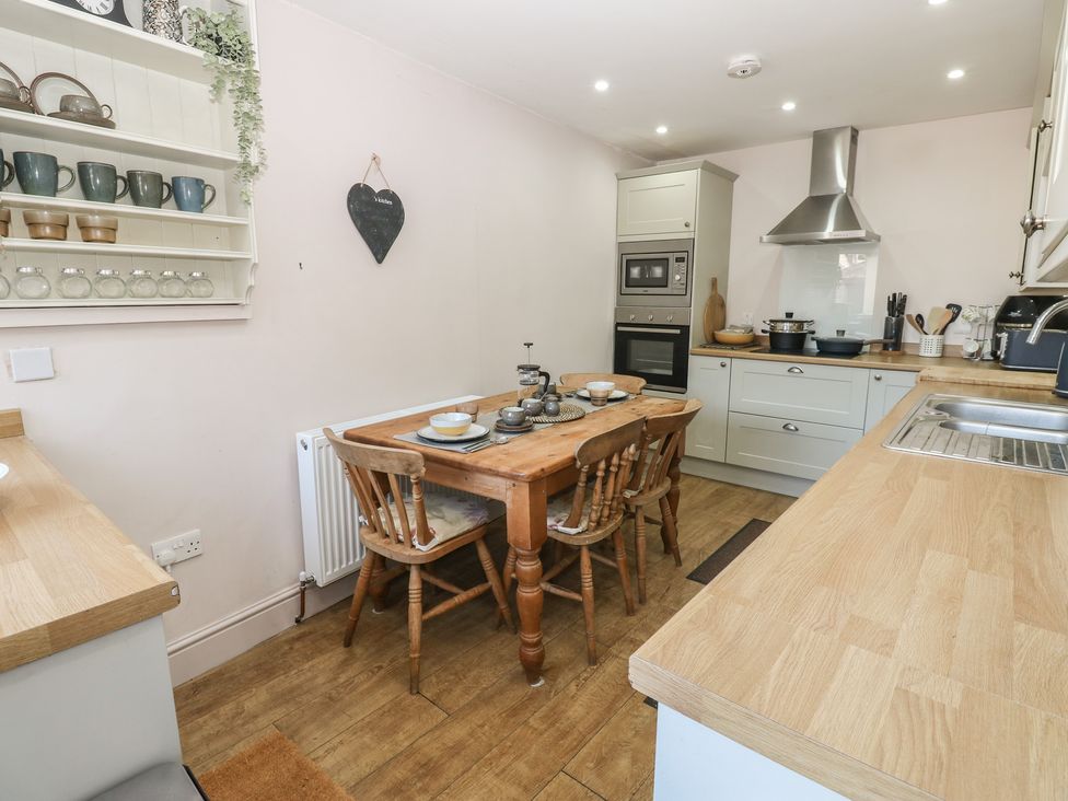 A kitchen with dining table and chairs at Banklands in Mickleton, Teesdale