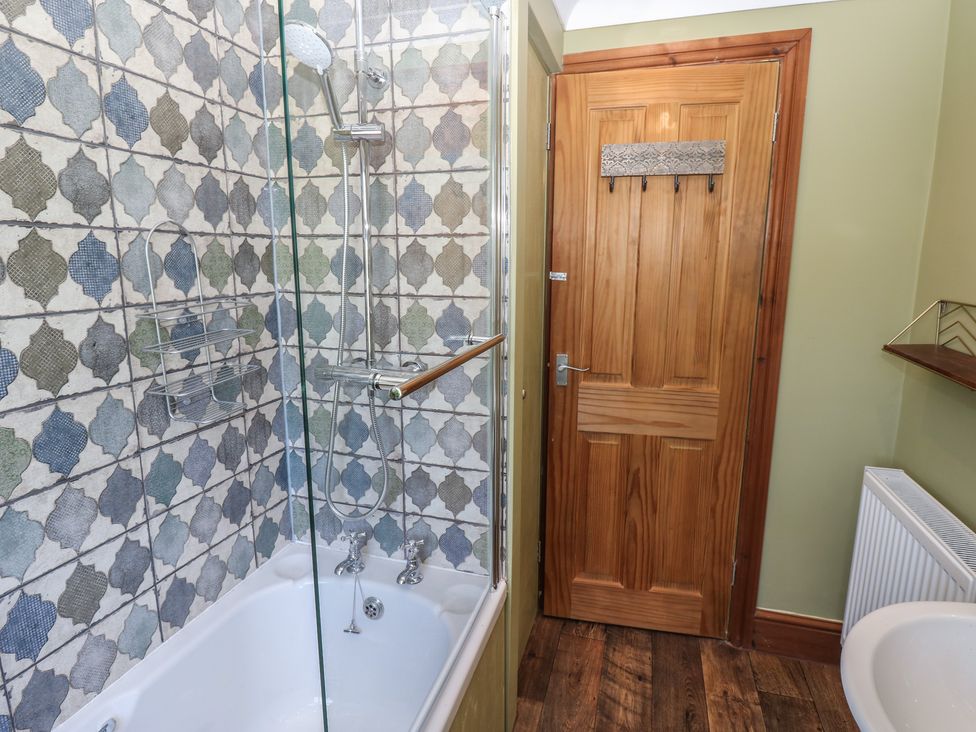 A bathroom with a shower and bathtub at Banklands in Mickleton, Teesdale