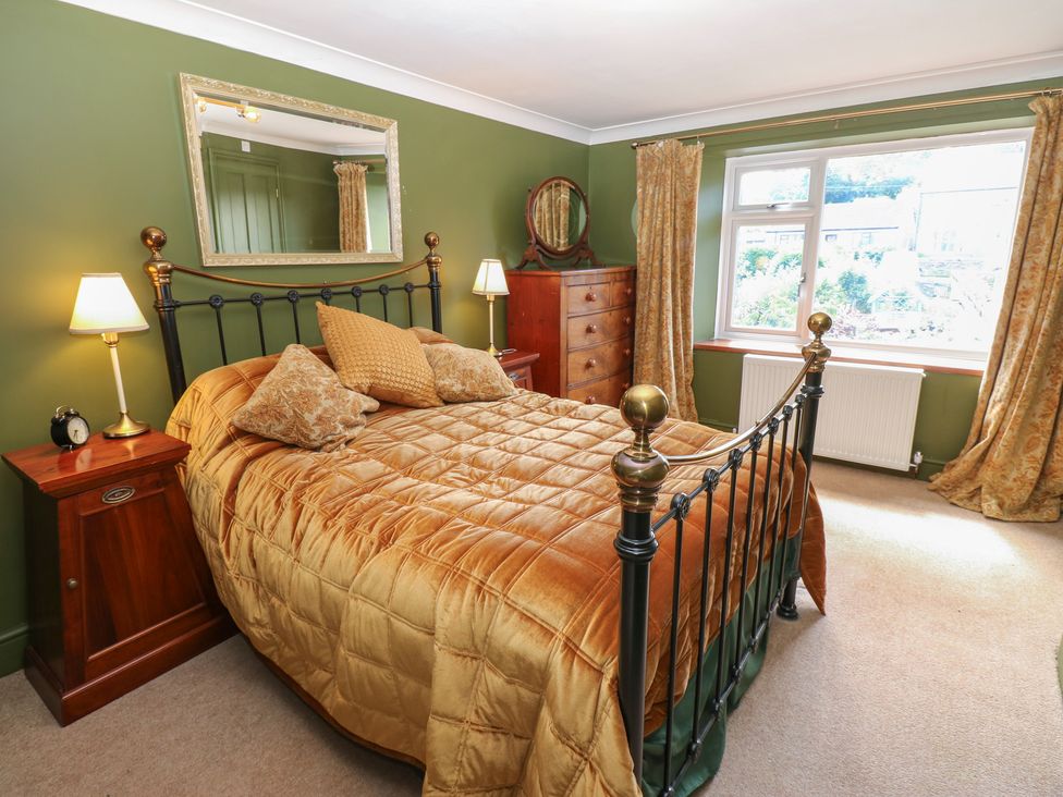 A bedroom with a bed and bedside tables at Banklands Mickleton, Teesdale