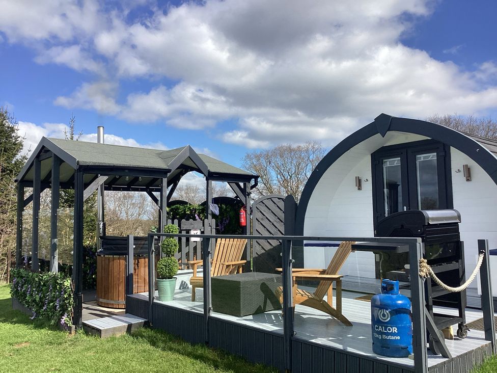An outdoor area with gazebo and grill at Cherry Pod Hookagate near Meole Brace