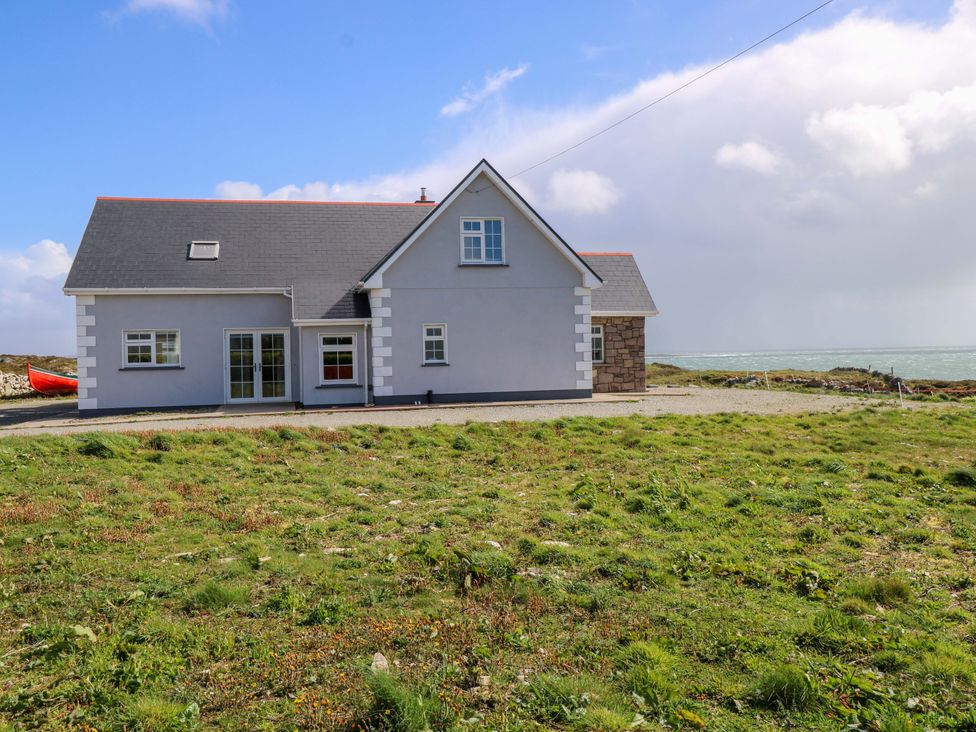 A house near the sea with a garden area at Tí Tom Nárta Trabane near Lettermore, County Galway