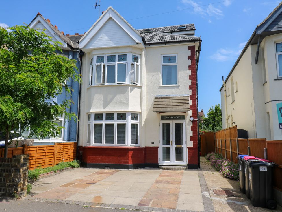 A house with a pathway and trees at Ninety Eight in Southend-On-Sea