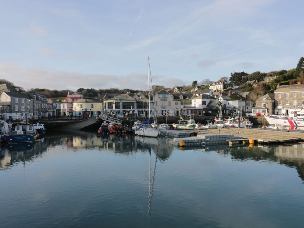 A harbor with boats and buildings at Penpoll Little Petherick Creek near Padstow