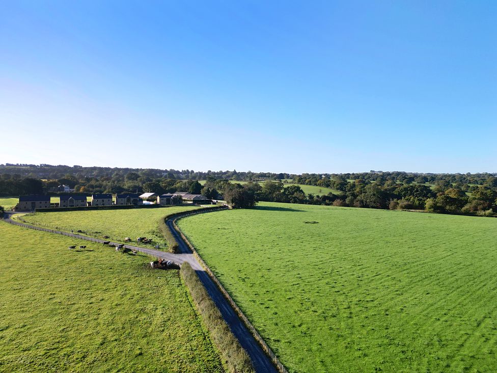 An aerial view of fields and houses at Archstone House in Langho, Lancashire