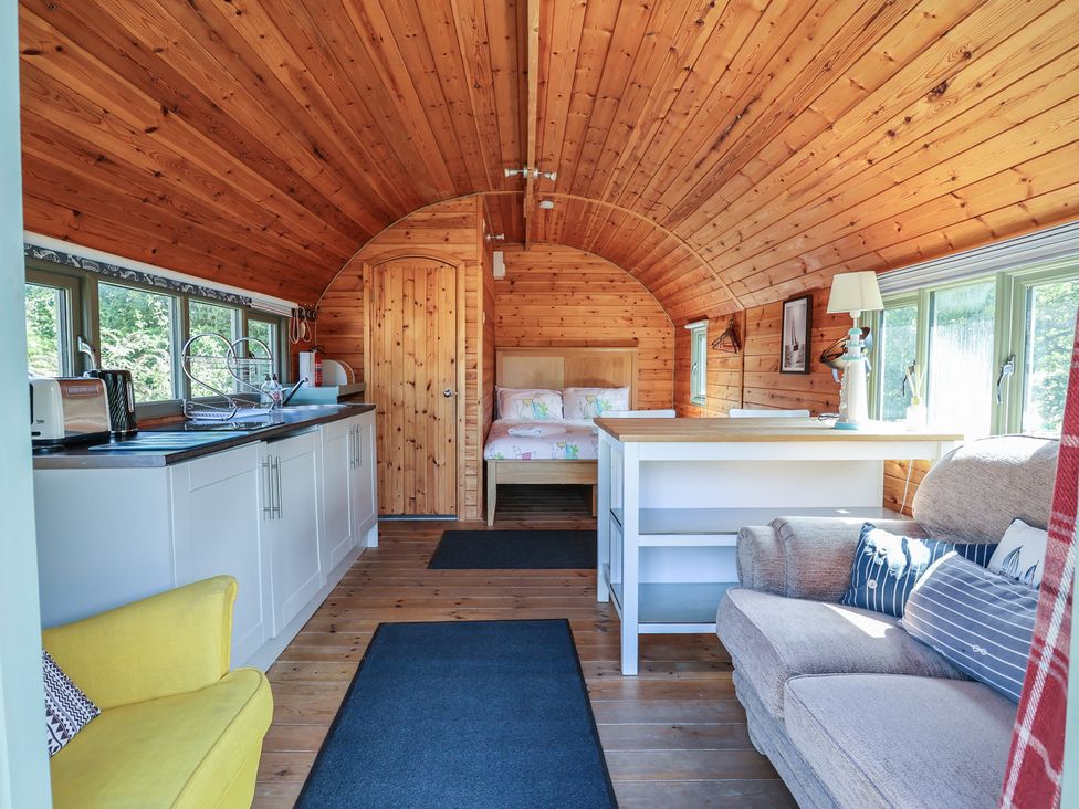 A studio with a kitchen area and sleeping area at Gayton Stables in Heswall