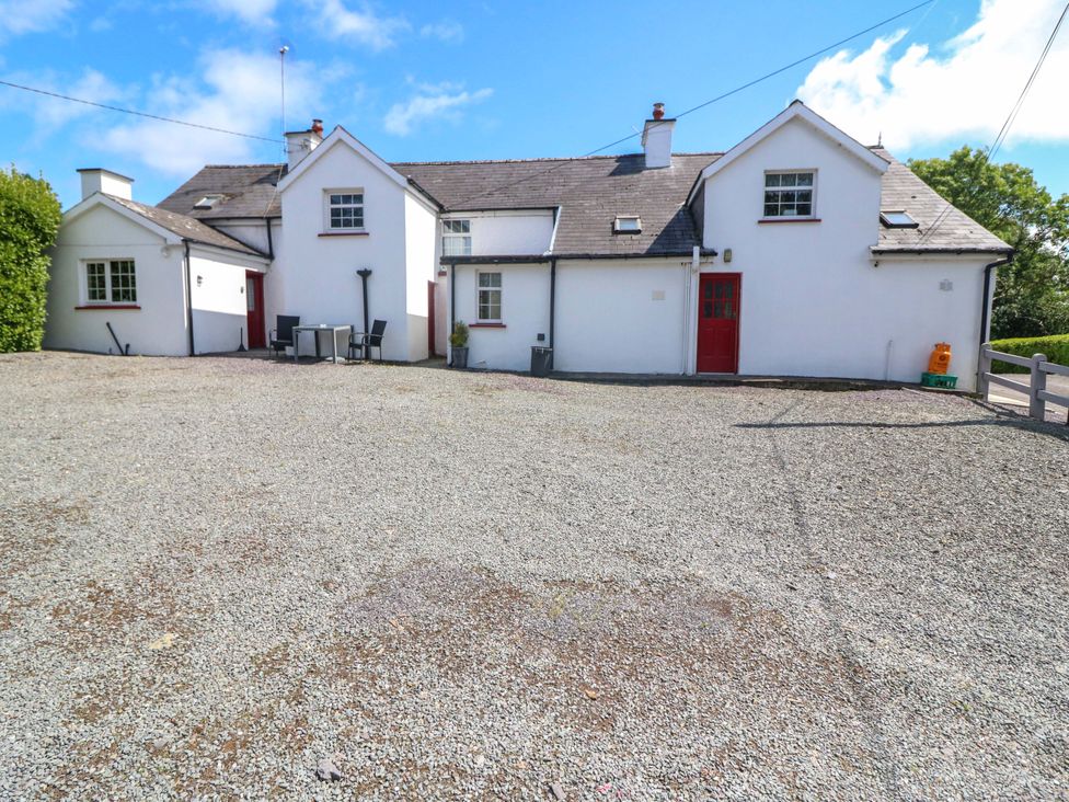 An exterior view of a house with a gravel area at Waterfall House in Dunmanway, County Cork