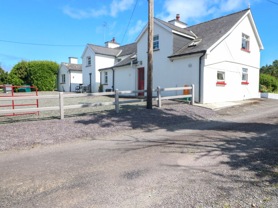A house with a fence and gate at Waterfall House, Dunmanway, County Cork