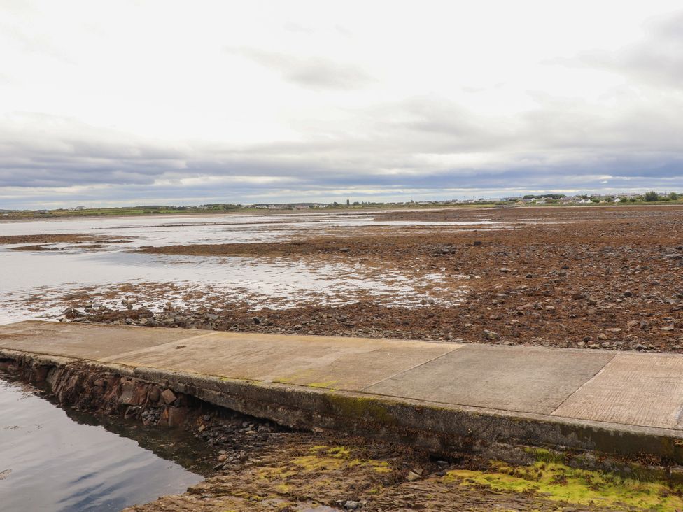 A landscape view with water and rocks at 29 Church Field in Doonbeg, County Clare