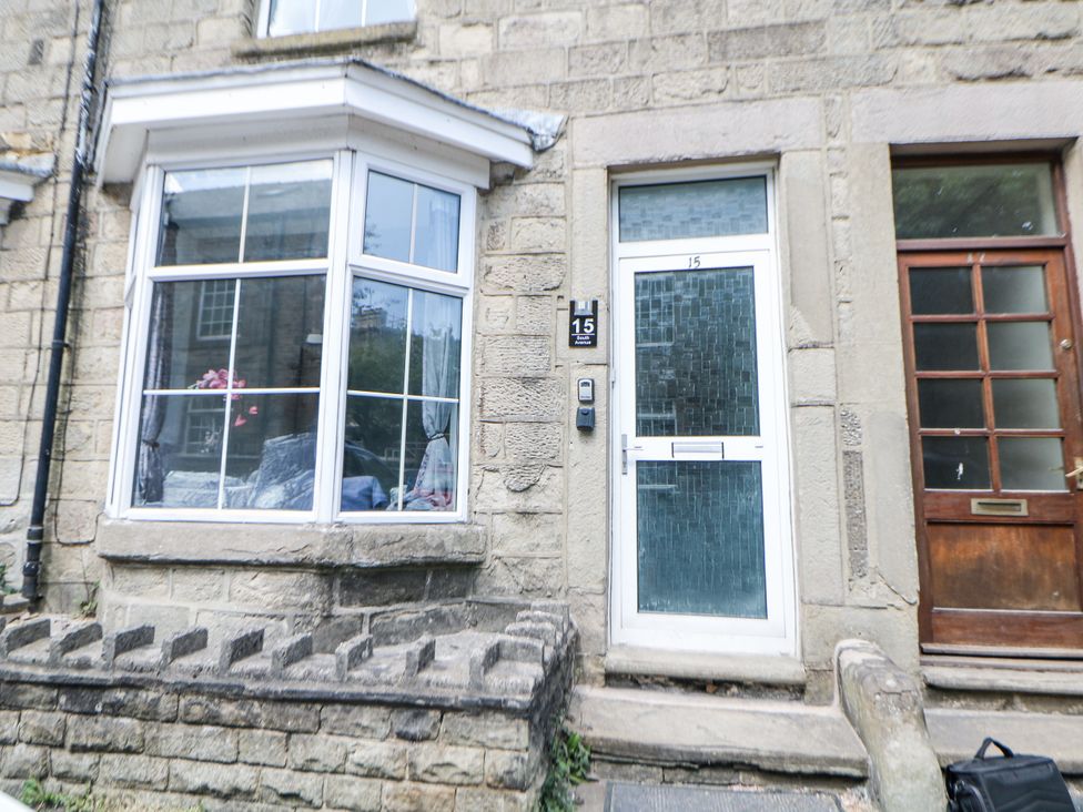 An entrance with a door and window at 15 South Avenue Mews in Buxton