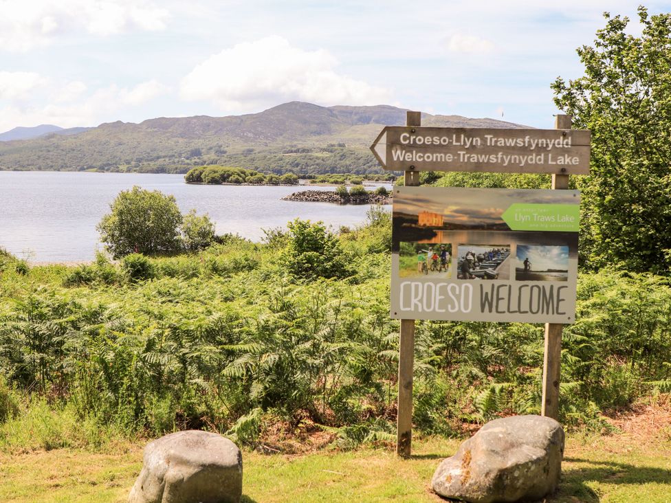 A sign by a lake at Babbling Brook Bron Aber near Blaenau Ffestiniog