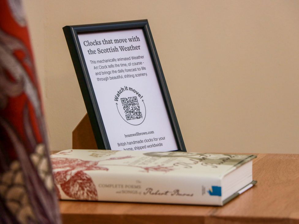 A framed sign about clocks and a book at Clocktower - Culzean Castle in Maybole