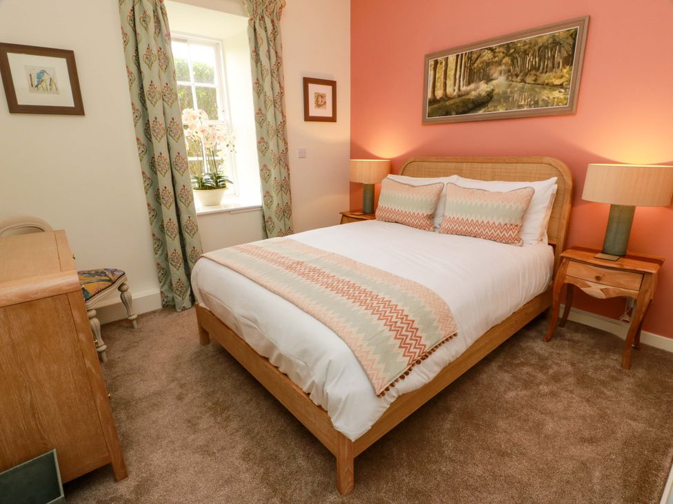 A bedroom with a bed and bedside tables at Clocktower - Culzean Castle, Maybole