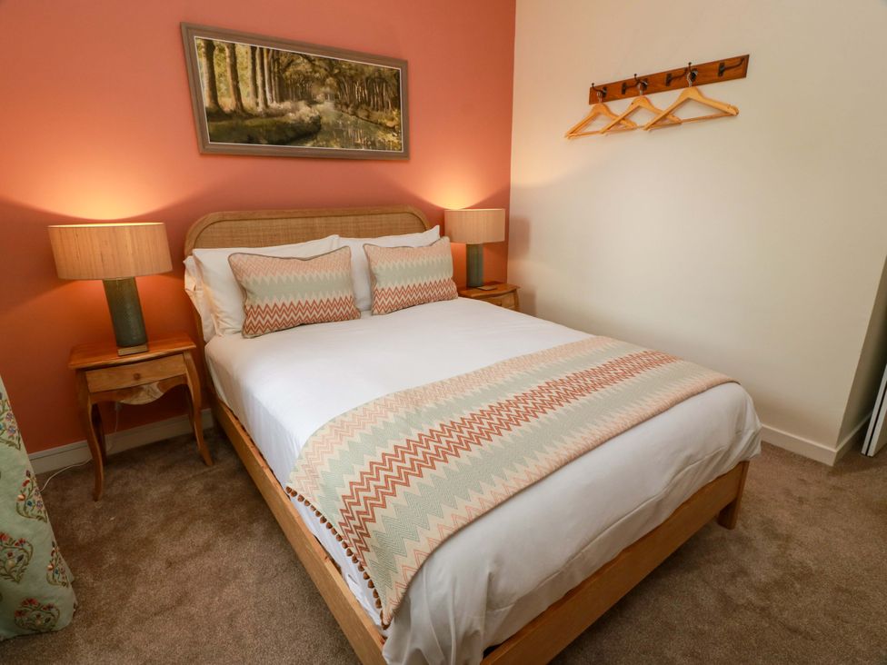 A bedroom with a bed and bedside tables at Clocktower - Culzean Castle in Maybole