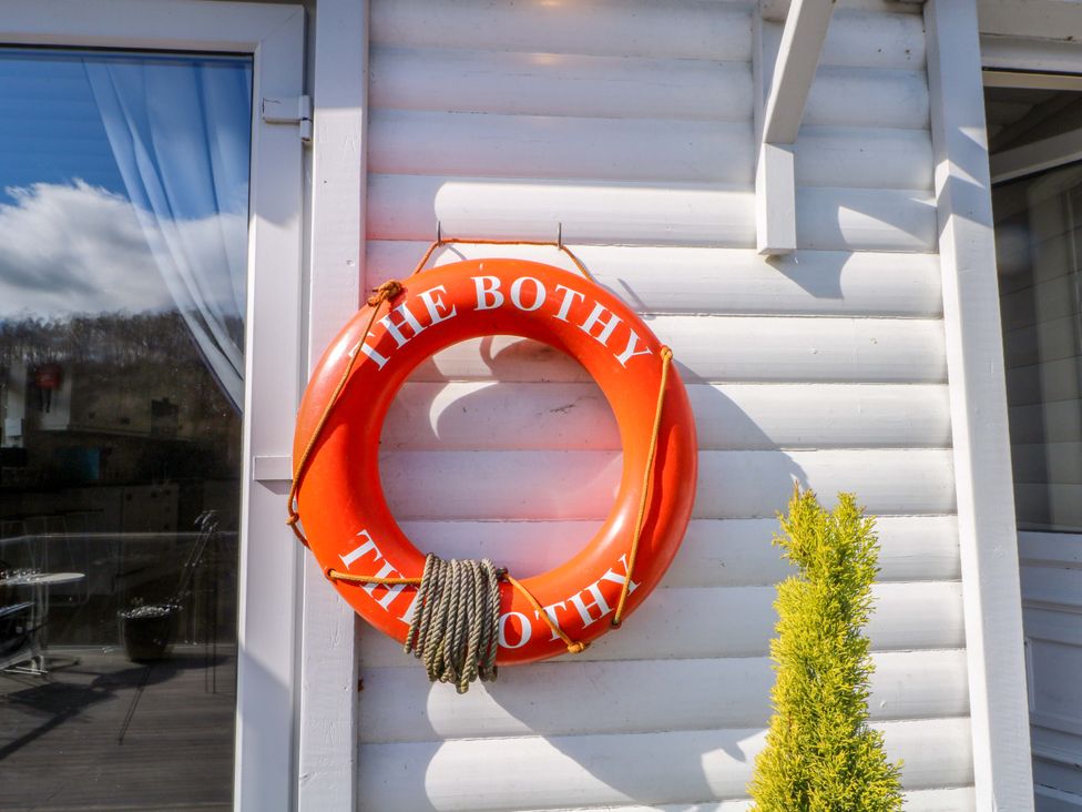 A lifebuoy mounted on an exterior wall at The Bothy in Leek