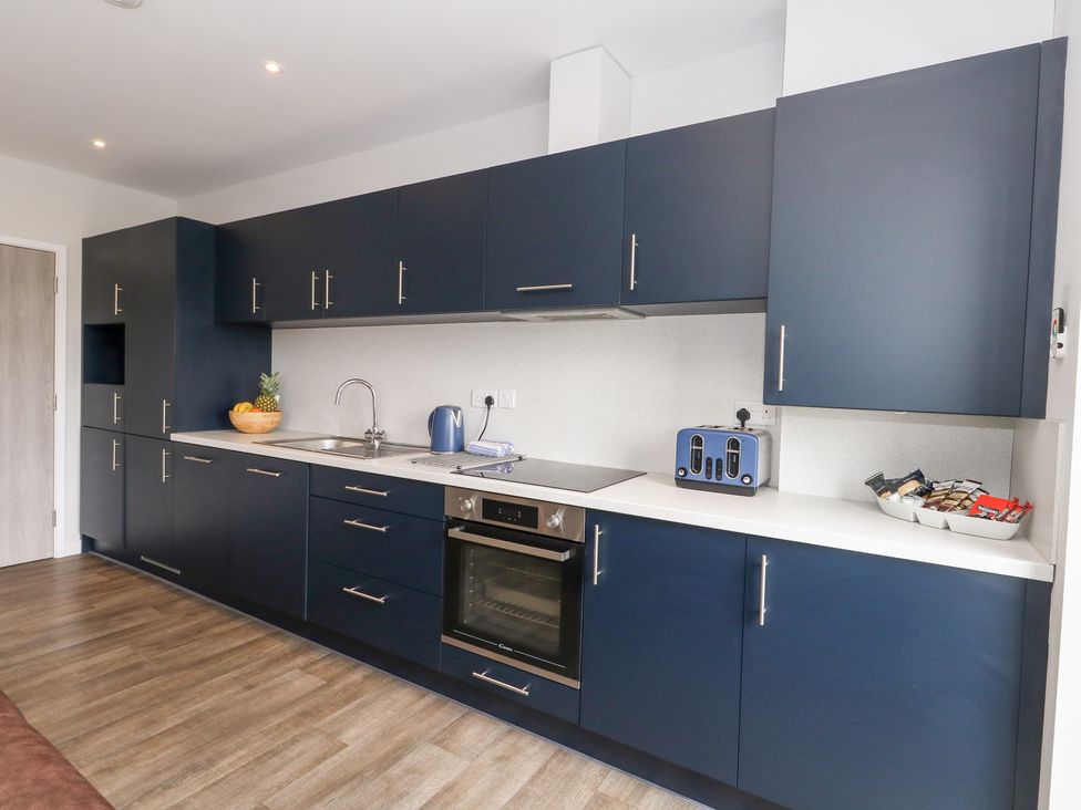 A kitchen with cabinets and countertop at Durbyfield in Nottington near Weymouth