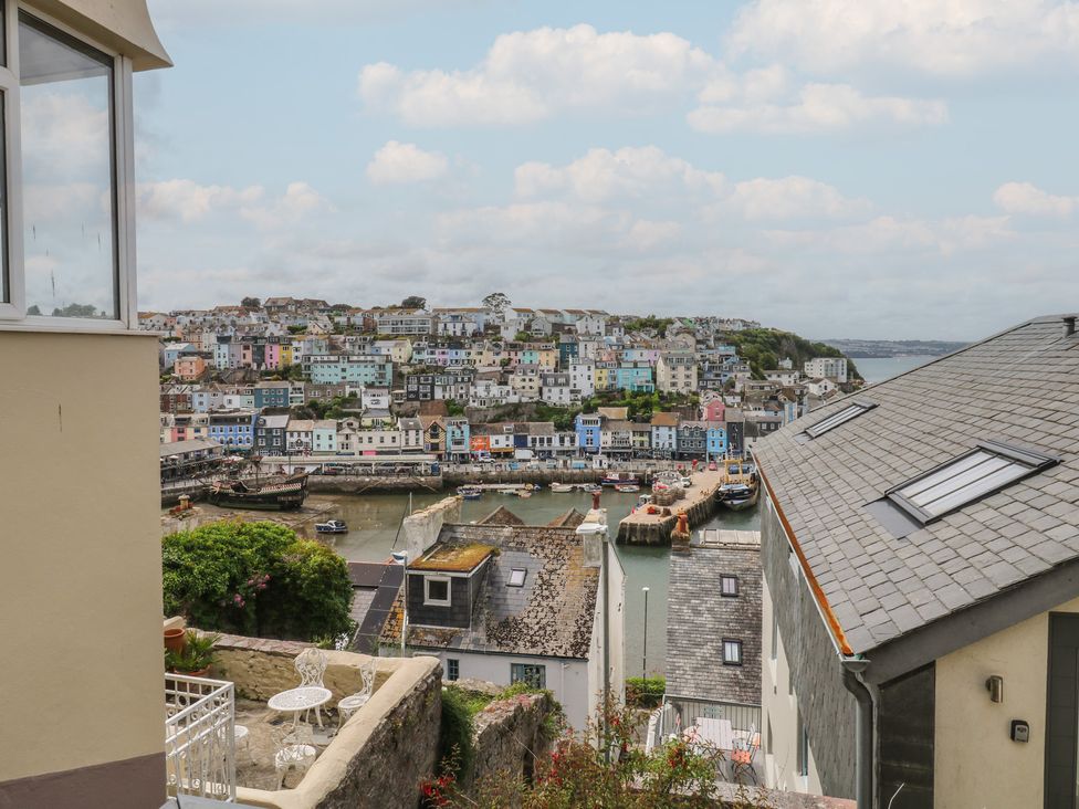 View of a harbor with colorful houses and boats at Bay View in Brixham