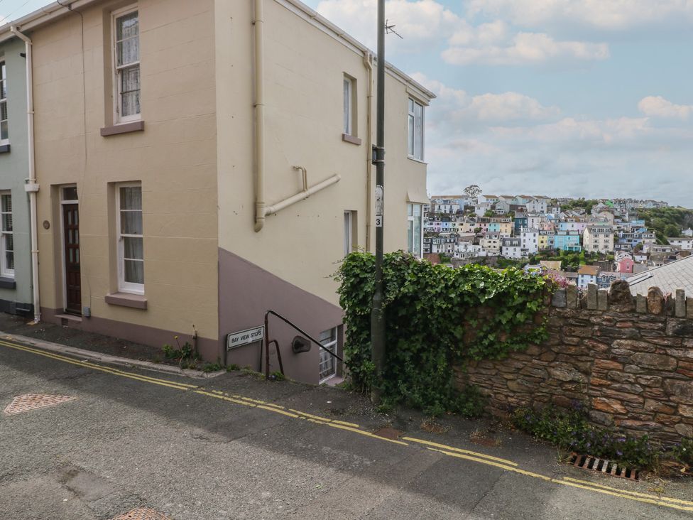 A street view of a residential building with steps at Bay View in Brixham