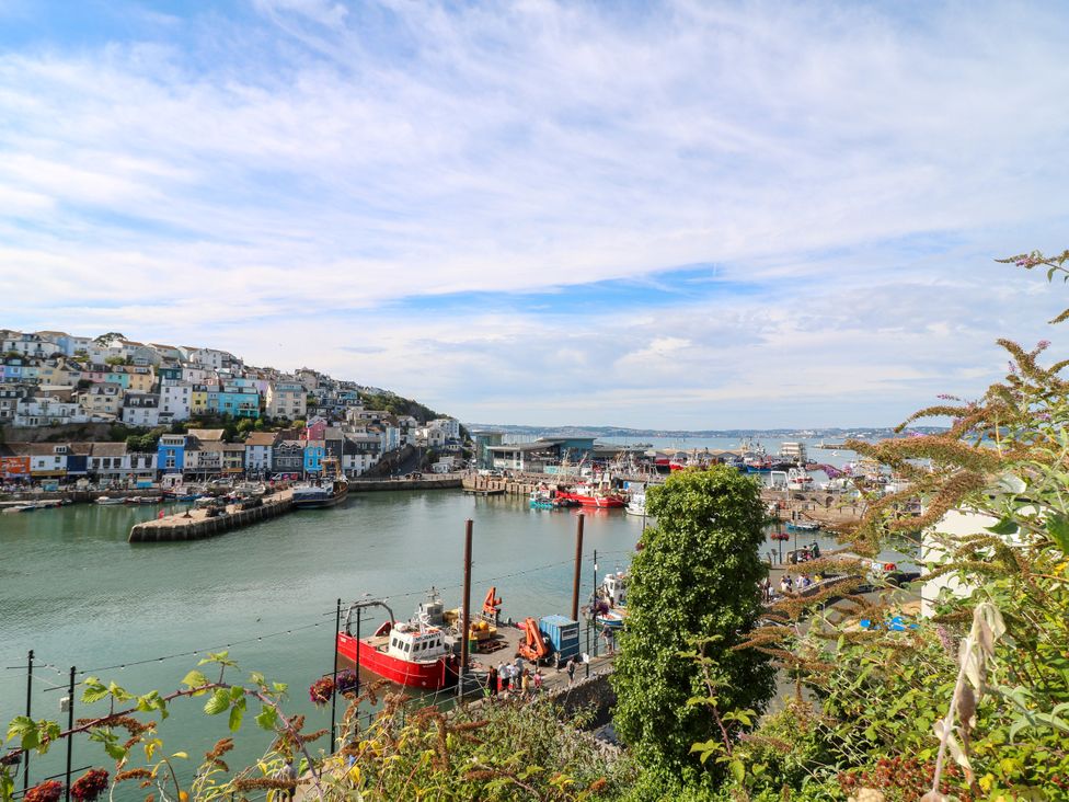 A harbor view with boats and buildings at Bay View in Brixham